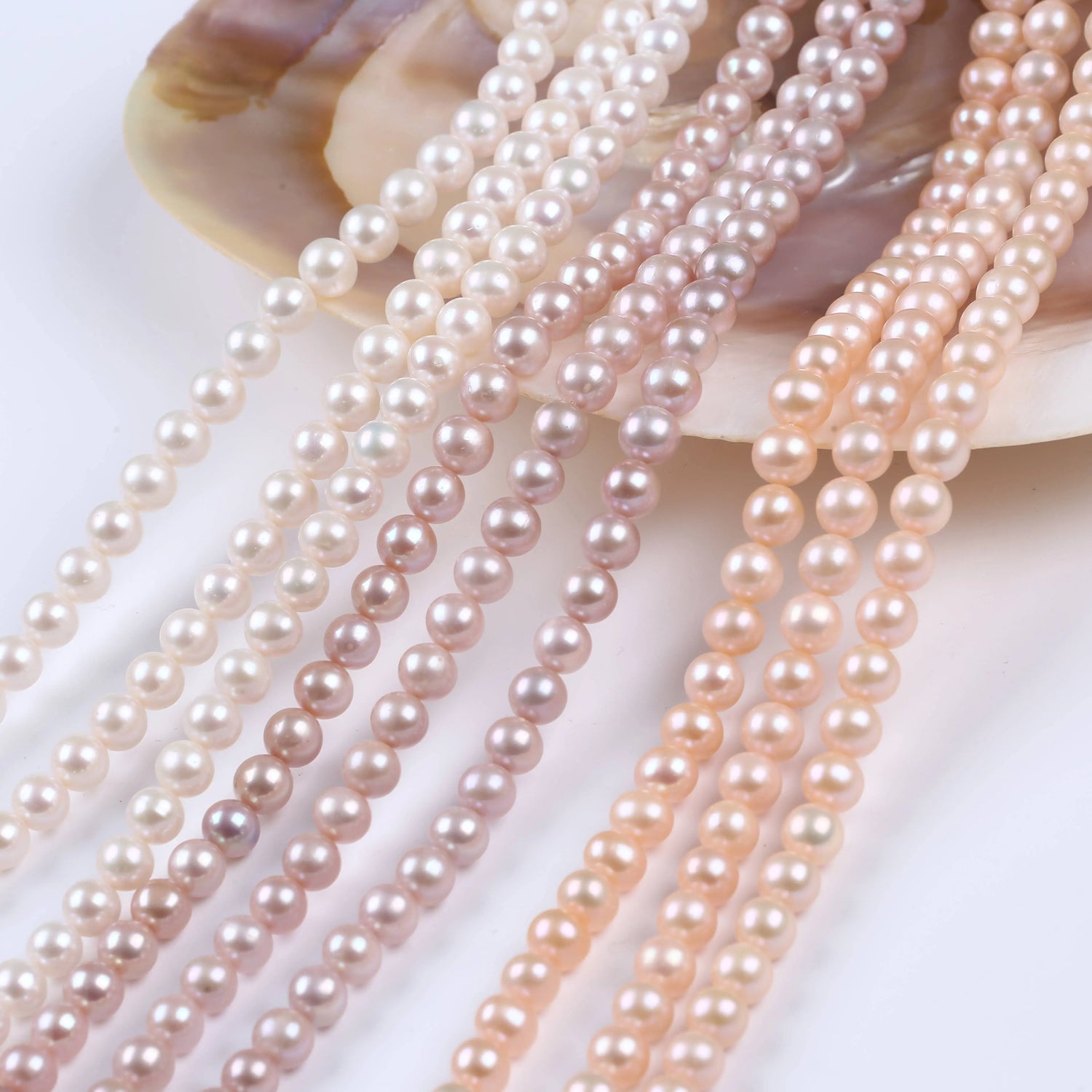 PEROLA REDONDA A 8-9 MM - 1 FIO -38 CM