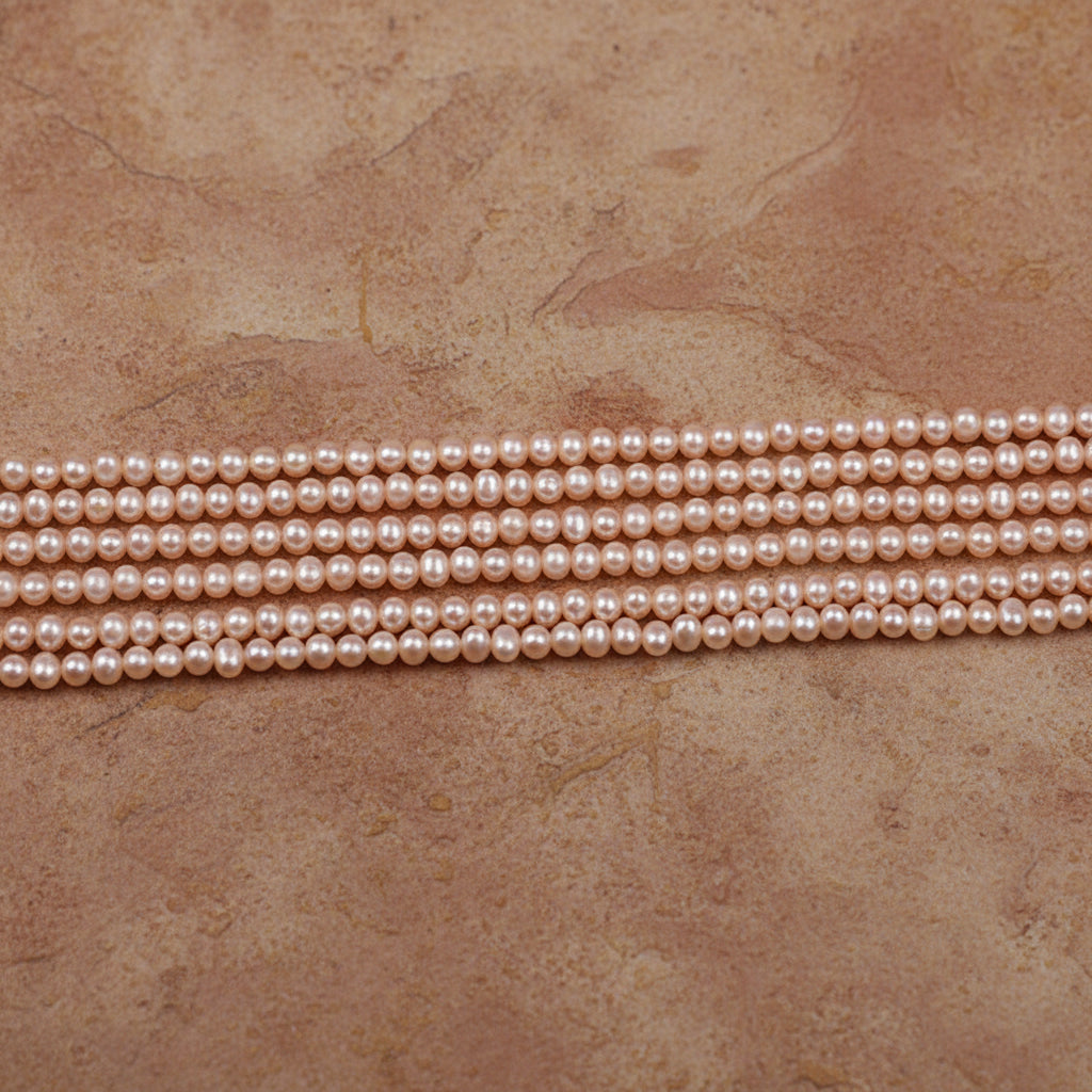 PEROLA POTATO 3-3.5 MM CORES LILAS E ROSA - 1 FIO - 38 CM